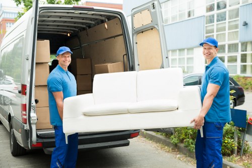 Man with van in Slough loading furniture for a local move