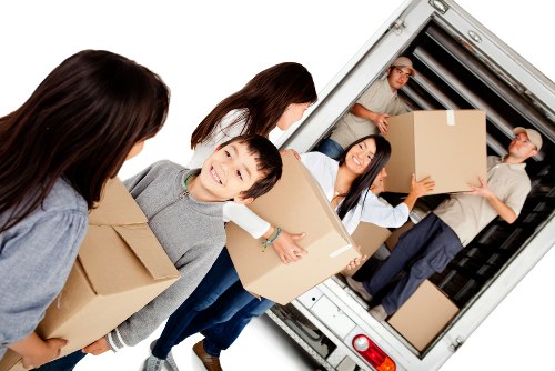 Removal van and moving boxes prepared for a Slough home move