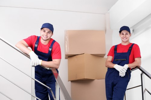 Packed boxes and small furniture ready for student removals