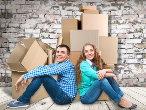 Packed boxes and furniture ready for removal services in Slough