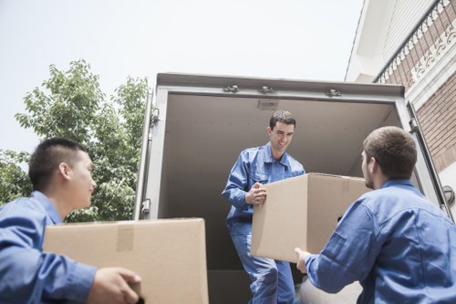 Professional office movers handling furniture and equipment in Slough