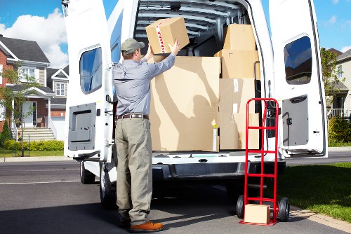 Professional movers handling bulky furniture in Slough