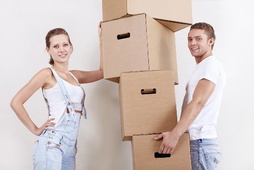 Packed office furniture ready for relocation in Slough